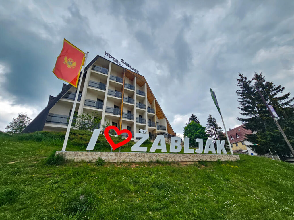 A sign spelling I heart Žabljak with a Montenegrin flag.
