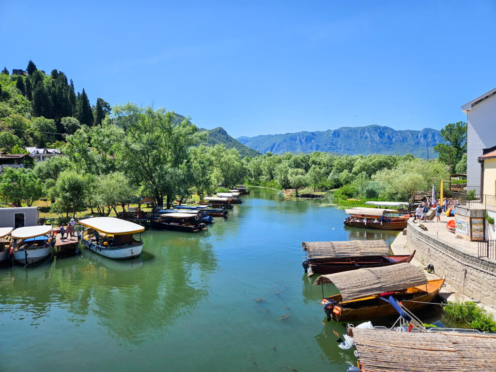 Lines of boats docked at Virpazar, a small town in Montenegro.