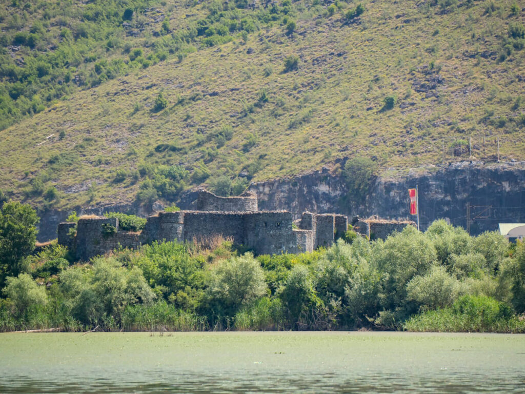The stone remains of Lesendro Fortress on the edge of Lake Skadar.