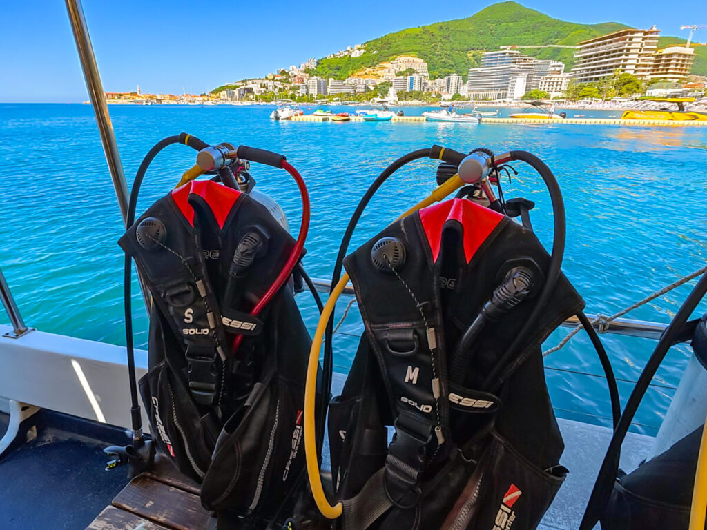 Two BCDs on tanks on a dive boat off Budva, Montenegro.