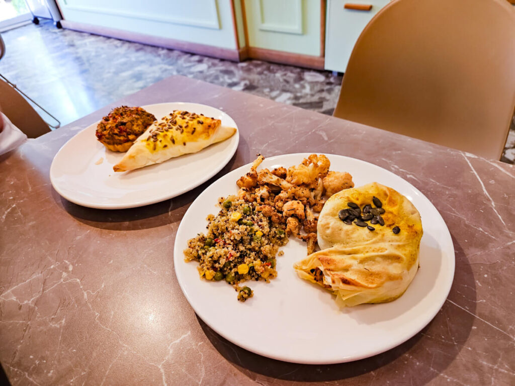 Healthy looking food on plates in a vegan restaurant in Budva.