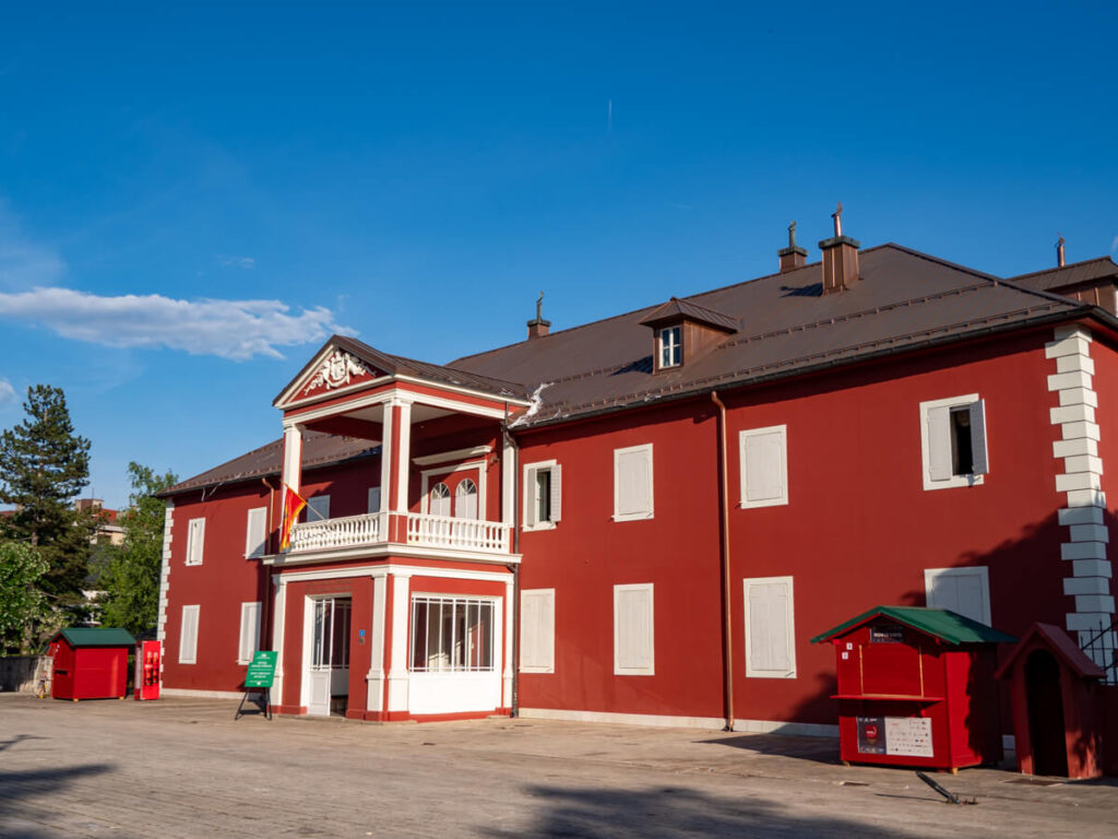 The bright red façade of the King Nikola Museum in Cetinje.