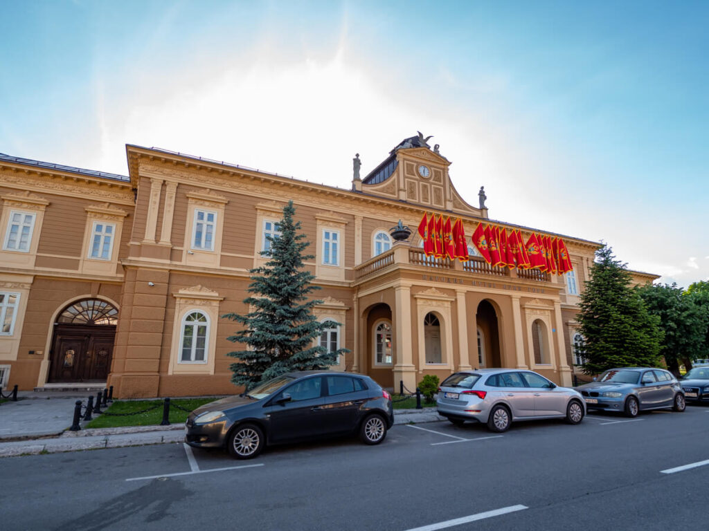 The orange façade of the National Museum of Montenegro in Cetinje.