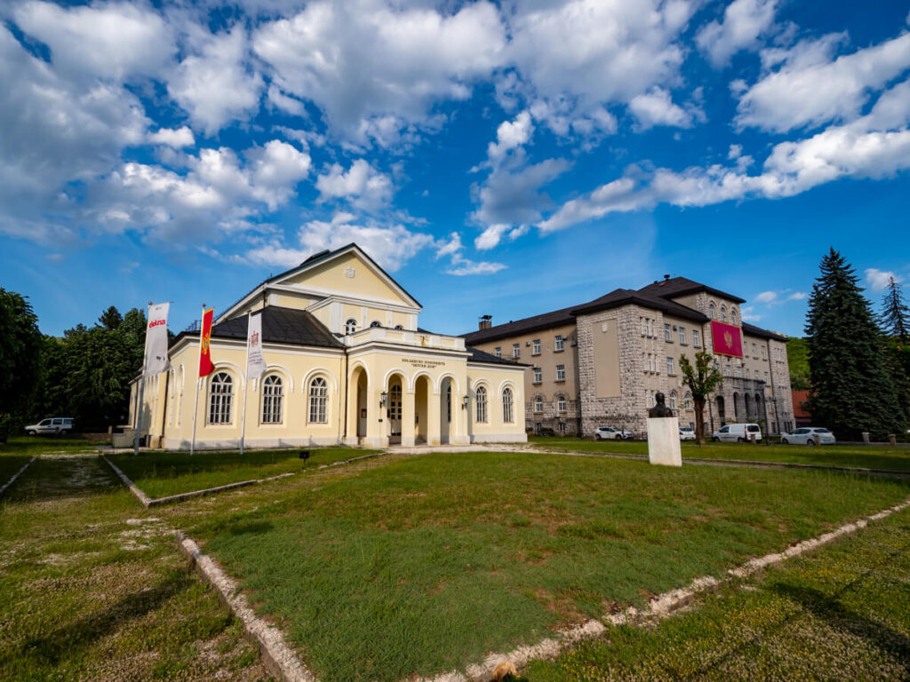 The pale yellow façade of the theatre in Cetinje.