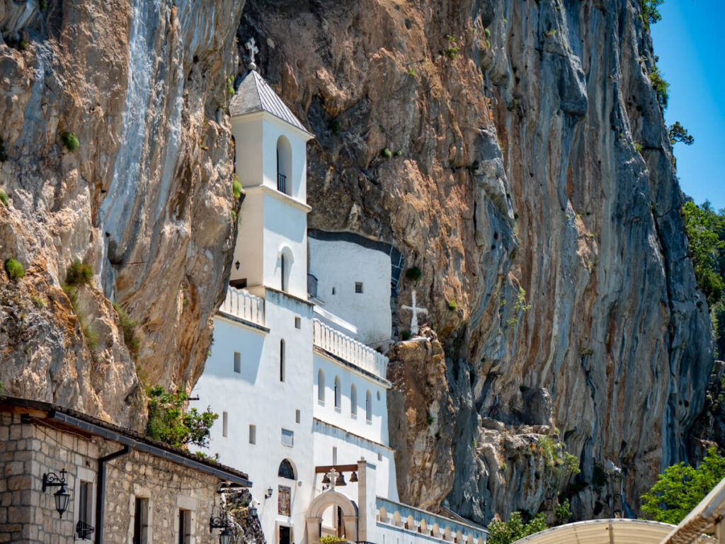 The whitewashed Ostrog Monastery carved into a sheer cliff in central Montenegro.