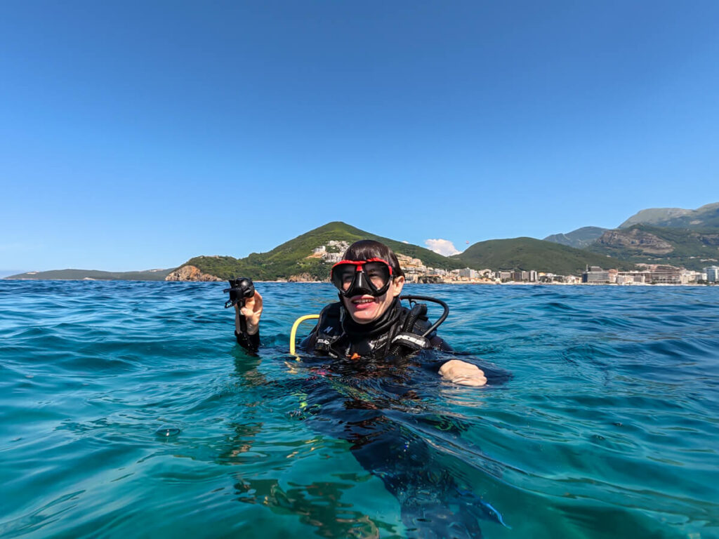 Dan in diving gear on the surface of the Adriatic Sea near Budva, Montenegro.