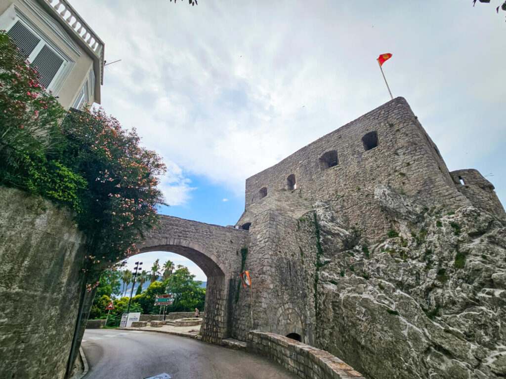 The stone facade and archway of the impressive Fortress Mare.