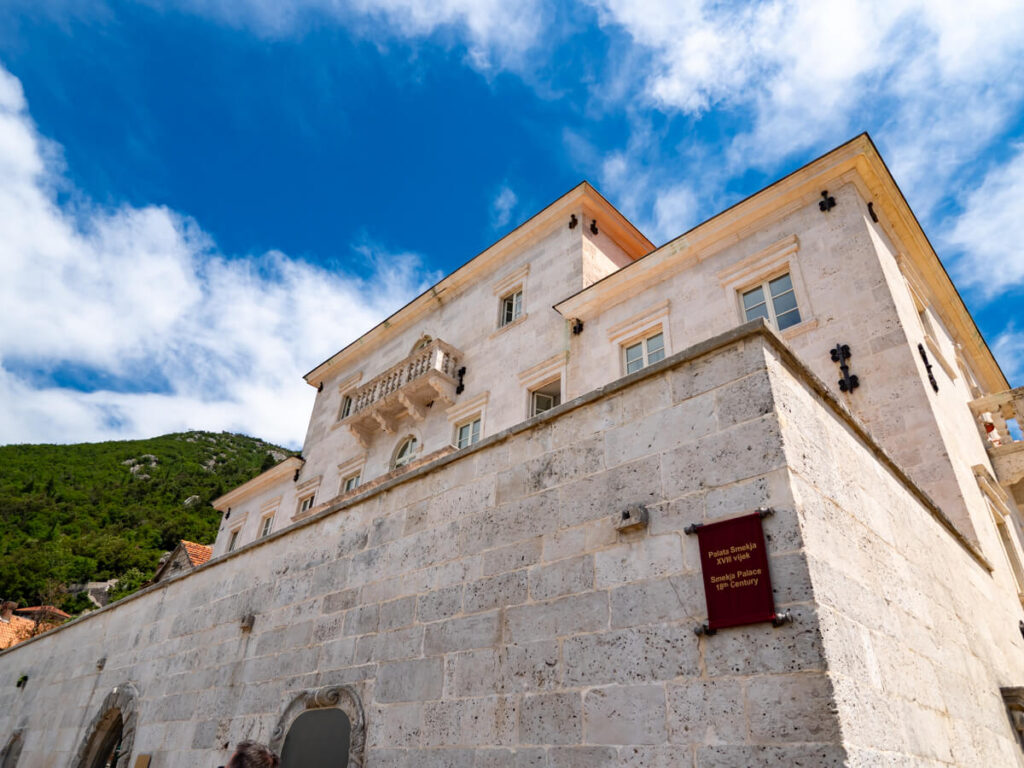 The grand stone building of the Heritage Grand Hotel in Perast, Montenegro.