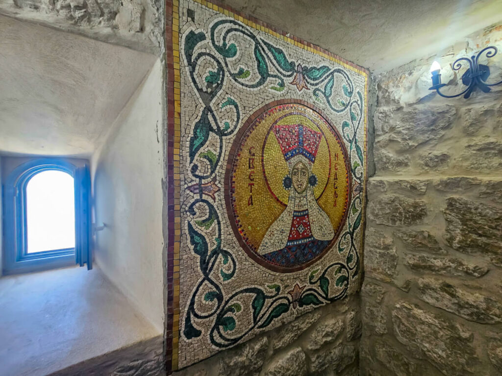 A mosaic on a wall in the stairwell in Ostrog Monastery.