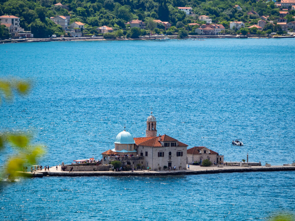 The iconic Our Lady of the Rocks, an artificial island with a church on the coast of Perast, Montenegro.