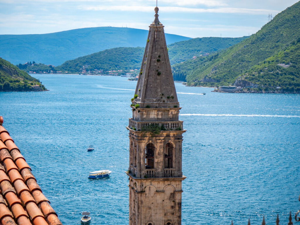 The bell tower of a church in Perast overlooking the Bay of Kotor.