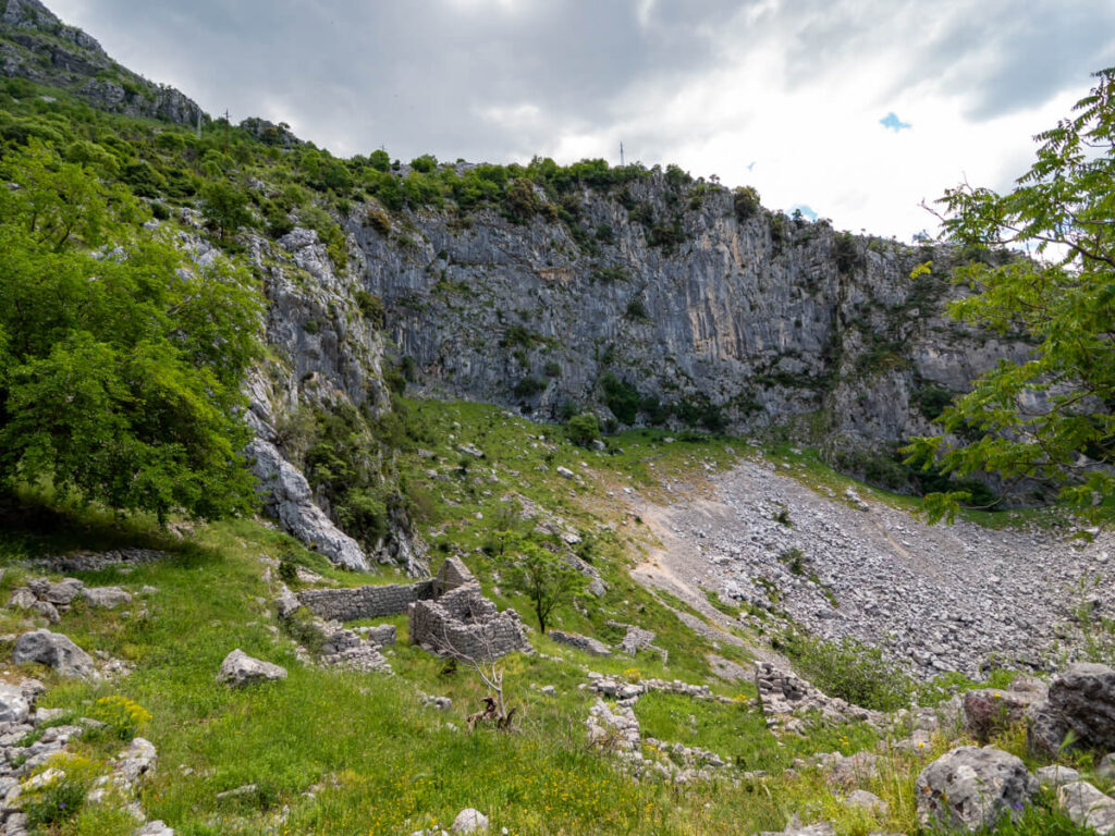 Ruins of stone houses in the abandoned village of Spiljari near Kotor.