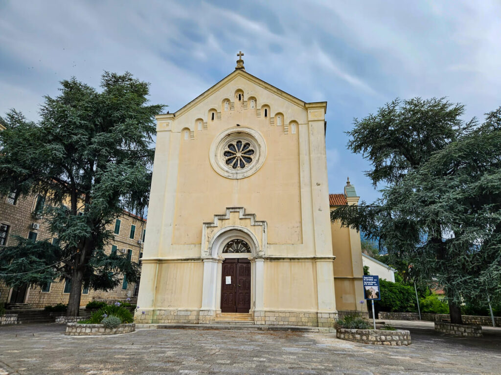 The simple façade of Saint Jerome's Church in Herceg Novi, one of the best day-trips from Kotor.