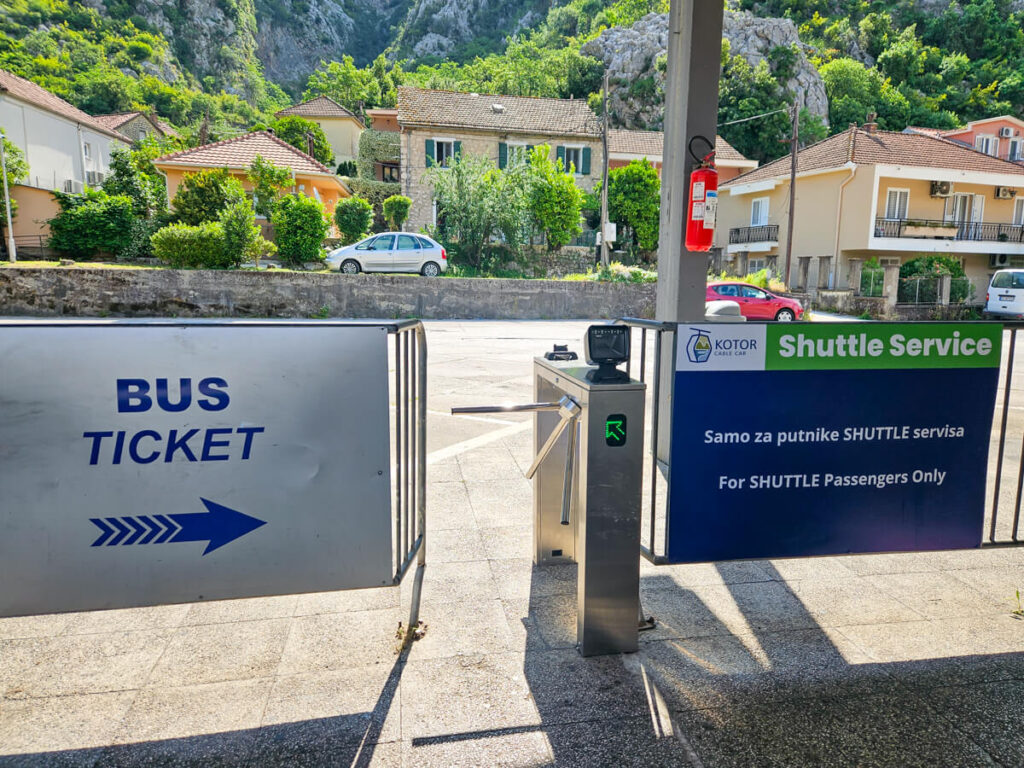 A sign in Kotor Bus Terminal indicating the queue for the shuttle bus to the cable car.
