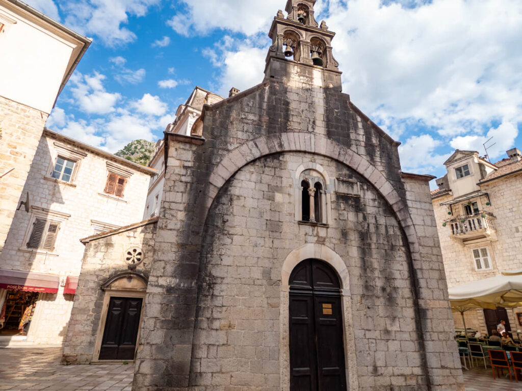 The triple bell tower on top of the St Luke's Church in Kotor Old Town.