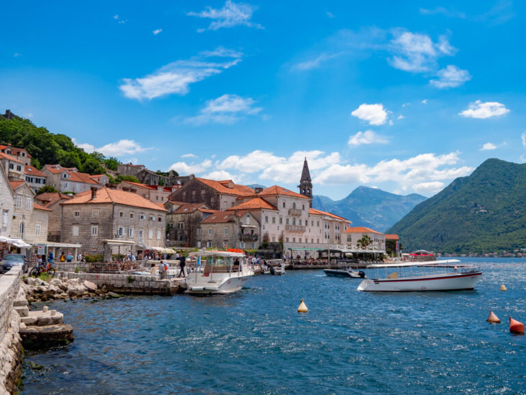 The red-roofed buildings of Perast, one of the best places to visit in the Bay of Kotor.
